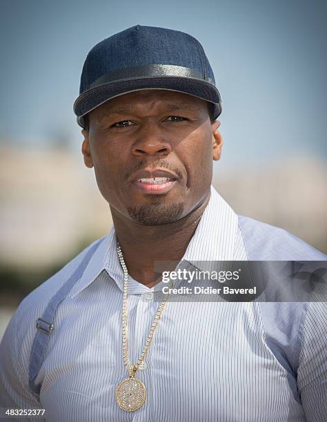 Curtis "50 Cent" Jackson poses during the photocall of 'Power' at MIPTV 2014 at Hotel Majestic on April 7, 2014 in Cannes, France.