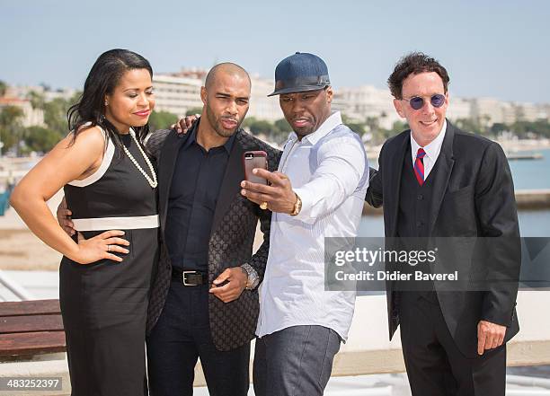 Courtney Kemp Agboh, Omari Hardwick, Curtis "50 Cent" Jackson and Mark Canton pose during the photocall of 'Power' at MIPTV 2014 at Hotel Majestic on...