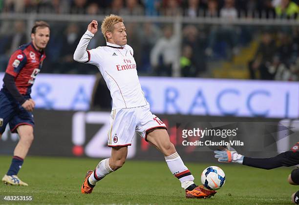 Keisuke Honda of AC Milan scores the second goal during the Serie A match between Genoa CFC v AC Milan at Stadio Luigi Ferraris on April 7, 2014 in...