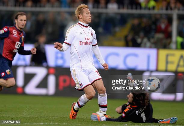 Keisuke Honda of AC Milan scores the second goal during the Serie A match between Genoa CFC v AC Milan at Stadio Luigi Ferraris on April 7, 2014 in...