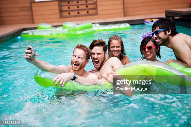 Middle Friends Pool Friends Playing In The Pool High-Res Stock Photo - Getty Images