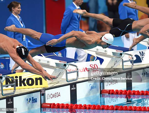 Ning Zetao of China takes the start of the final of the Men's 100m Freestyle final during day thirteen of The 16th FINA World Swimming Championships...