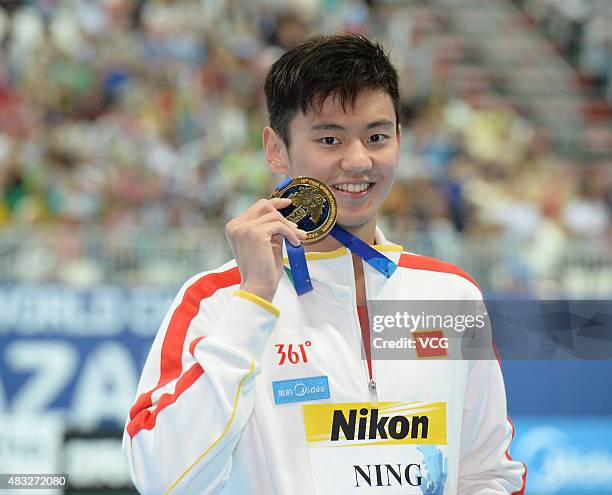 Gold medalist Ning Zetao of China poses during the medal ceremony for the Men's 100m Freestyle on day thirteen of the 16th FINA World Championships...