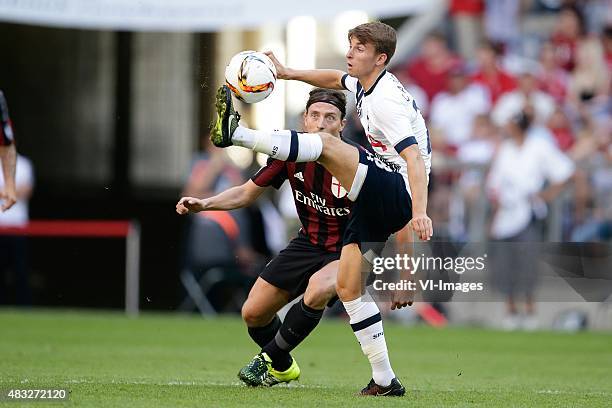 Riccardo Montolivo of AC Milan, Tom Carroll of Tottenham Hotspur during the AUDI Cup bronze final match between Tottenham Hotspur and AC Milan on...