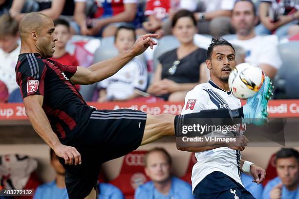 Alex of AC Milan, Nacer Chadli of Tottenham Hotspur during the AUDI Cup bronze final match between Tottenham Hotspur and AC Milan on August 5, 2015...