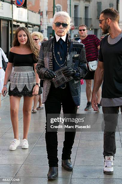 Karl Lagerfeld is seen strolling on the harbour of Saint tropez on August 6, 2015 in Saint-Tropez, France.