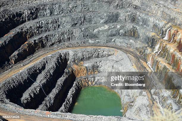 Water pools at the bottom of the open mine pit at Evolution Mining Ltd.'s gold operations in Mungari, Australia, on Wednesday, Aug. 5, 2015. A...