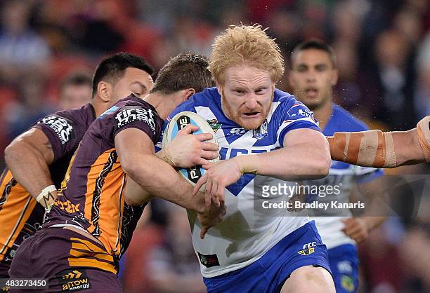 James Graham of the Bulldogs takes on the defence during the round 22 NRL match between the Brisbane Broncos and the Canterbury Bulldogs at Suncorp...