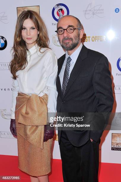 Sylvia Hoeks and Giuseppe Tornatore attend the 'The Best Offer' Paris Premiere at Publicis Champs Elysees on April 7, 2014 in Paris, France.