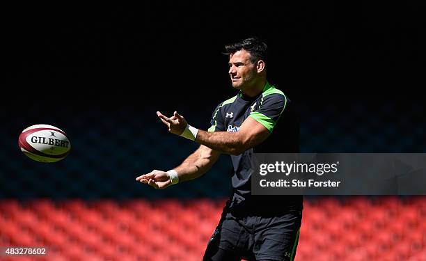 Wales player Mike Phillips in action during Wales training ahead of saturday's World Cup warm up match against Ireland at Millenium Stadium on August...