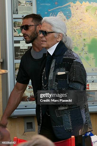 Karl Lagerfeld is seen strolling on the harbour of Saint Tropez on August 6, 2015 in Saint-Tropez, France.