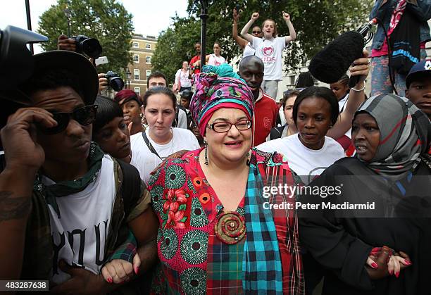 Kids Company founder Camila Batmanghelidjh is surrounded by supporters and camera crews as she attempts to join other staff members in a rally...