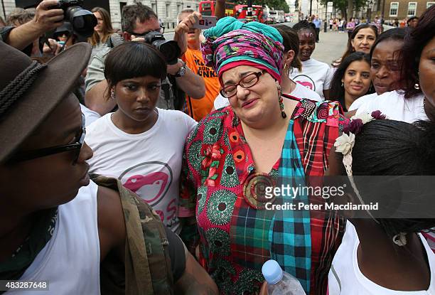 Kids Company founder Camila Batmanghelidjh is surrounded by supporters and camera crews as she attempts to join other staff members in a rally...