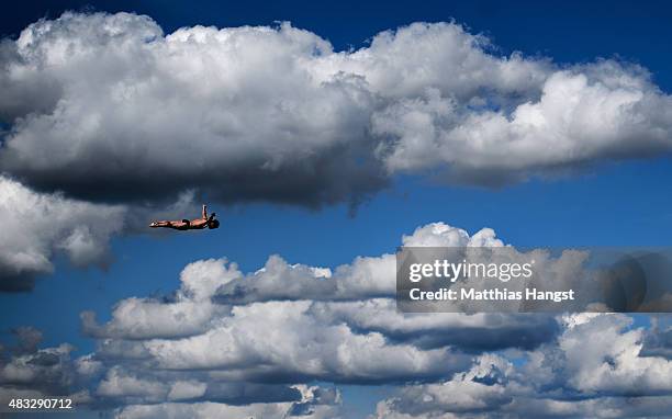 Carlos Gimeno of Spain competes in the Men's High Diving 27m preliminary round on day ten of the 16th FINA World Championships at the Kazanka River...