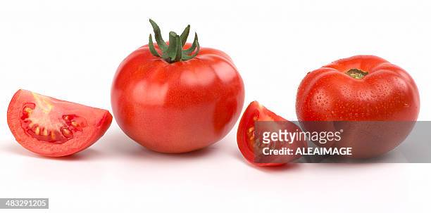 red tomatoes and slices - tomato isolated stock pictures, royalty-free photos & images