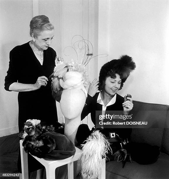 Paulette Dubost at the milliner, 1945 in Paris, France.