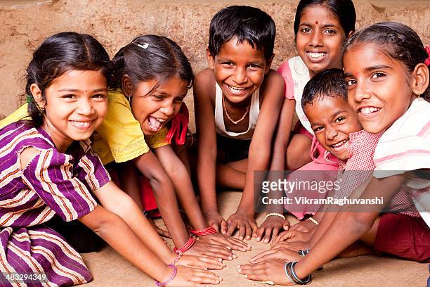 cheerful indian children playing in maharashtra - group of kids stock pictures, royalty-free photos & images