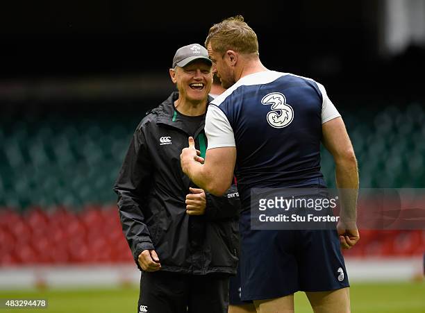 Ireland captain Jamie Heaslip shares a joke with coach Joe Schmidt during Ireland's captains run prior to saturday's Rugby World Cup warm up match...