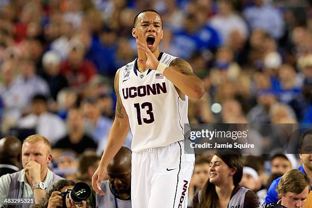 Shabazz Napier of the Connecticut Huskies reacts during the NCAA Men's Final Four Championship against the Kentucky Wildcats at AT&T Stadium on April...