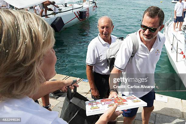 King Felipe VI of Spain arrives at the Royal Nautical Club during the 34th Copa del Rey Mapfre Sailing Cup day 5 on August 7, 2015 in Palma de...