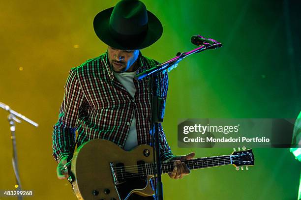 The American singer and musician Ben Harper with checked shirt, guitar and a Borsalino hat, in concert at Assago Summer Arena. Assago, Milan , 22nd...