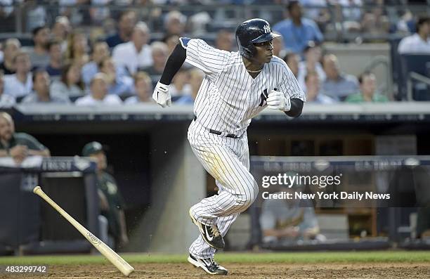 New York Yankees shortstop Didi Gregorius hit scores New York Yankees catcher Brian McCann New York Yankees vs. Oakland A's at Yankee Stadium. Bronx,...