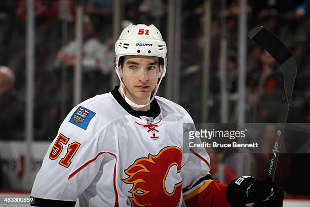 Ken Agostino of the Calgary Flames skates against the New Jersey Devils at the Prudential Center on April 7, 2014 in Newark, New Jersey. The Flames...