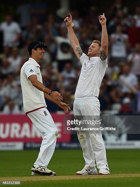Ben Stokes of England is congratulated by Steven Finn on taking the wicket of Mitchell Johnson of Australia during day two of the 4th Investec Ashes...