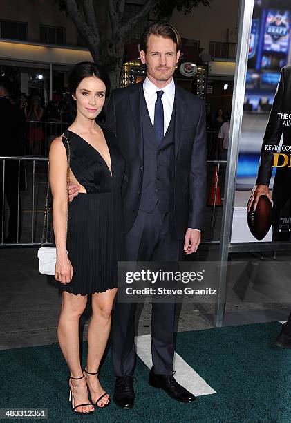 Actress Abigail Spencer and Andrew Pruett attend the Los Angeles premiere of "Draft Day" at Regency Village Theatre on April 7, 2014 in Westwood,...