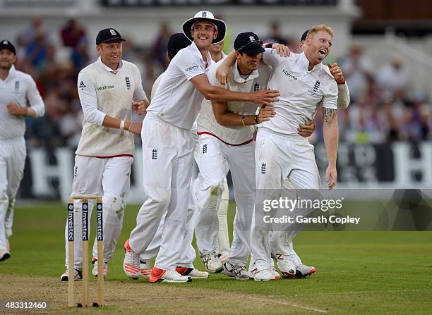 Ben Stokes of England celebrates with teammates after dismissing Mitchell Johnson of Australia during day two of the 4th Investec Ashes Test match...