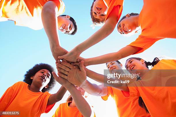 coach with group of children - middelste deel stockfoto's en -beelden