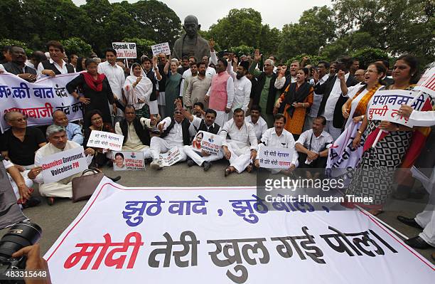Congress President Sonia Gandhi, Congress Vice President Rahul Gandhi during a protest against the Modi Government during the Monsoon session at...