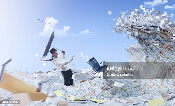 information flood - paper blowing stock pictures, royalty-free photos & images