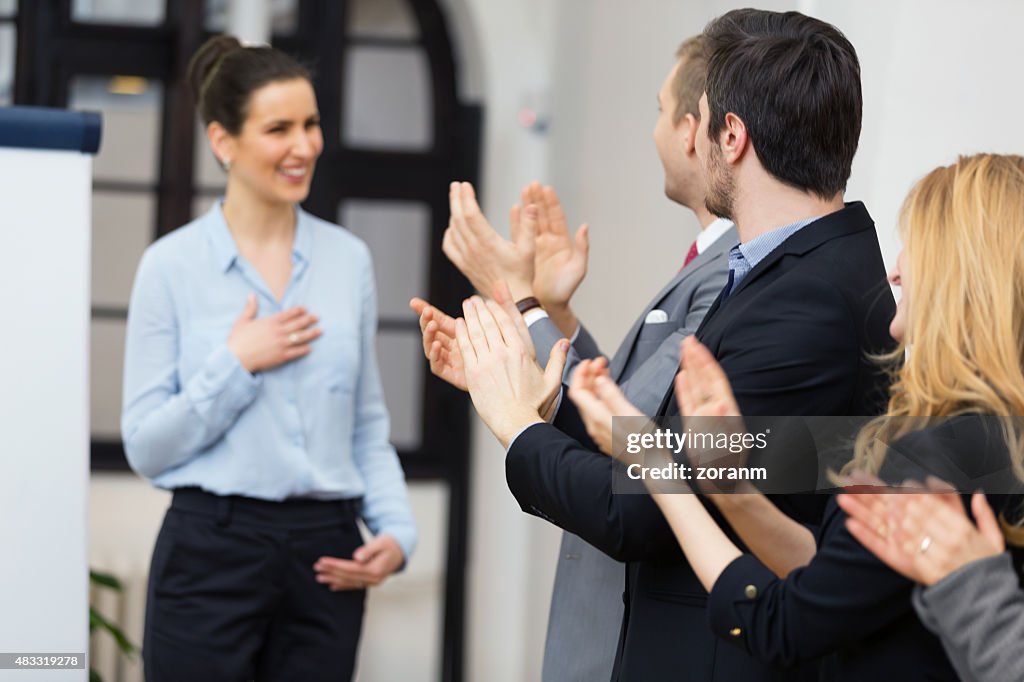 Applauding fsuccessful presentationor