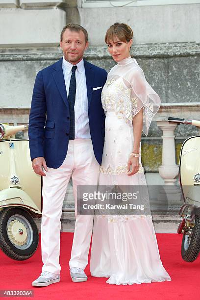 Guy Ritchie and Jacqui Ainsley attend the people's premiere of "The Man From U.N.C.L.E" during Film4 Summer Screenings at Somerset House on August 7,...