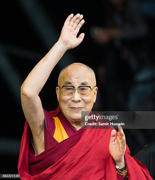 The Dalai Lama appears on The Pyramid Stage at the Glastonbury Festival at Worthy Farm, Pilton on June 28, 2015 in Glastonbury, England.