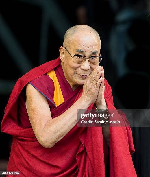 The Dalai Lama appears on The Pyramid Stage at the Glastonbury Festival at Worthy Farm, Pilton on June 28, 2015 in Glastonbury, England.