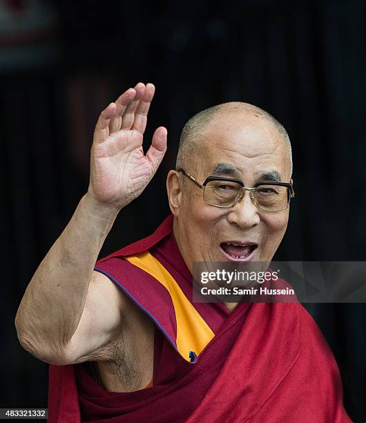 The Dalai Lama appears on The Pyramid Stage at the Glastonbury Festival at Worthy Farm, Pilton on June 28, 2015 in Glastonbury, England.