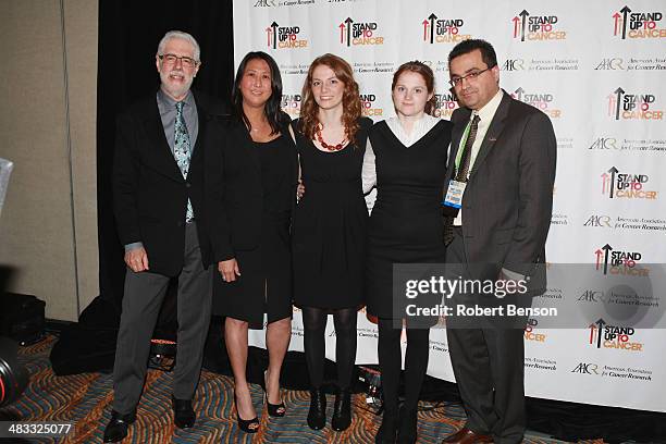 Dr. Ellis Reinherz , Sung Poblete, Justine Almada, Camille Almada and Dr. Robert Haddad attend the Stand Up to Cancer press event at the 2014 AACR...