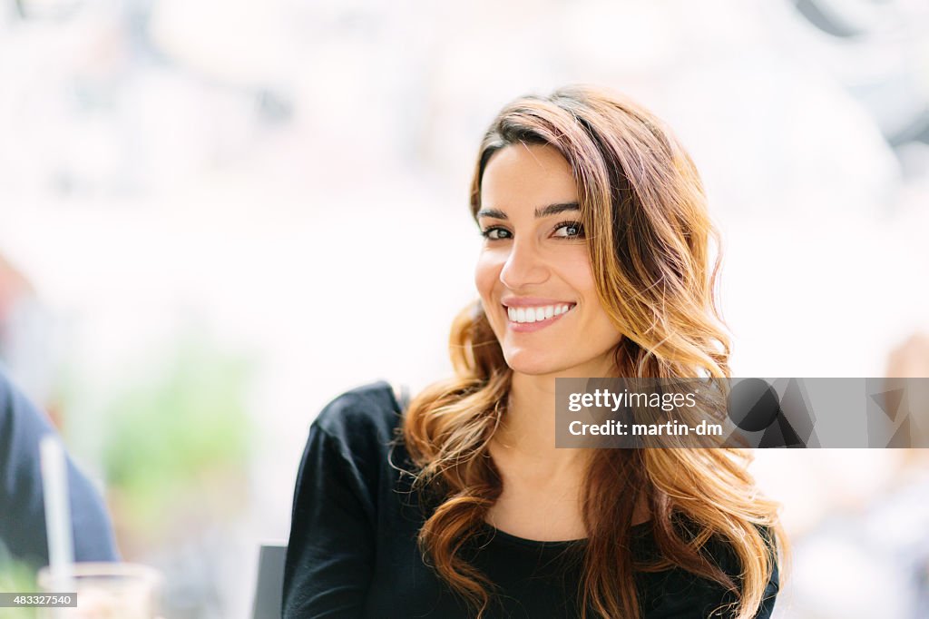 Smiling woman looking at camera