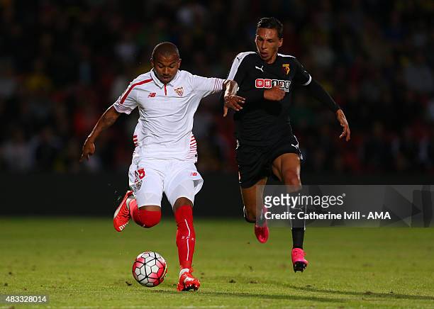 Mariano Ferreira of Sevilla and Jose Holebas of Watford during the pre-season friendly between Watford and Seville at Vicarage Road on July 31, 2015...