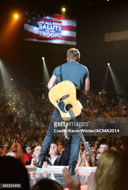 Musician Dierks Bentley performs onstage during ACM Presents: An All-Star Salute To The Troops at the MGM Grand Garden Arena on April 7, 2014 in Las...
