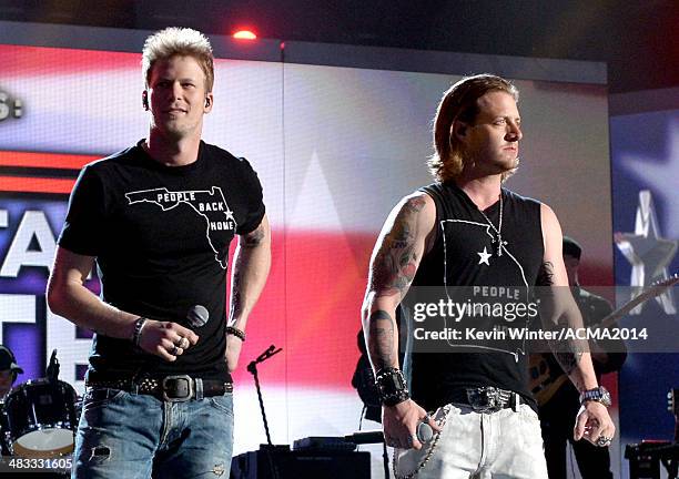 Singers Brian Kelley and Tyler Hubbard of Florida Georgia Line perform onstage during ACM Presents: An All-Star Salute To The Troops at the MGM Grand...