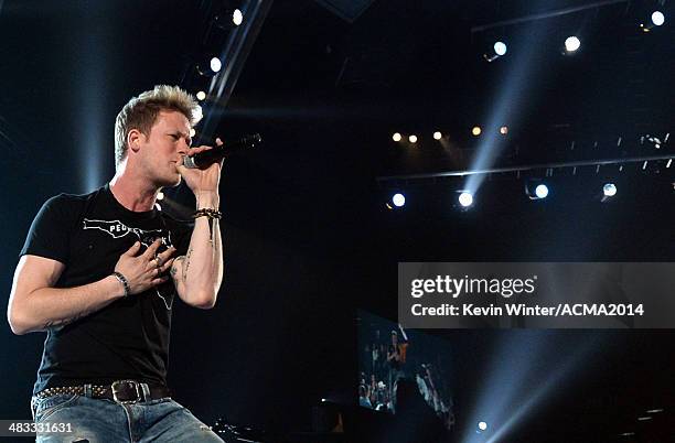 Singer Brian Kelley of Florida Georgia Line performs onstage during ACM Presents: An All-Star Salute To The Troops at the MGM Grand Garden Arena on...