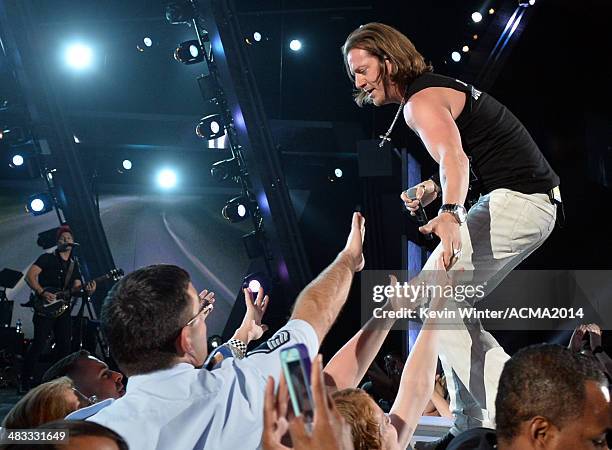 Singer Tyler Hubbard of Florida Georgia Line performs onstage during ACM Presents: An All-Star Salute To The Troops at the MGM Grand Garden Arena on...
