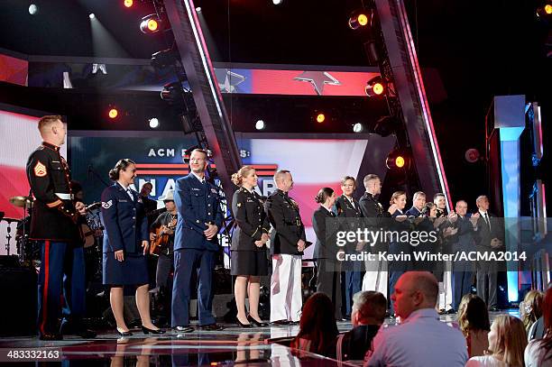 General view of troops onstage during ACM Presents: An All-Star Salute To The Troops at the MGM Grand Garden Arena on April 7, 2014 in Las Vegas,...