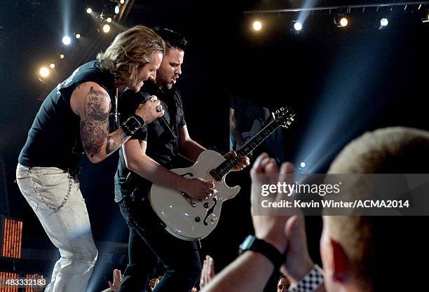 Singer Tyler Hubbard of Florida Georgia Line performs onstage during ACM Presents: An All-Star Salute To The Troops at the MGM Grand Garden Arena on...