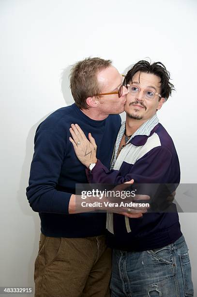 Paul Bettany and Johnny Depp at the "Transcendence" Press Conference at the Four Seasons Hotel on April 6, 2014 in Beverly Hills, California.