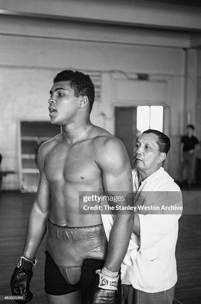 Cassius Rai Cassius Clay, between training sets at the Main Street Gym preparing ...
