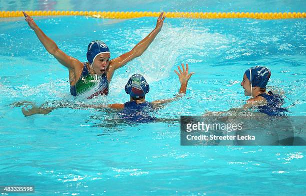 Tania Di Mario of Italy celebrates victory with Arianna Garibotti and Laura Barzon in the Women's bronze medal match between Australia and Italy on...